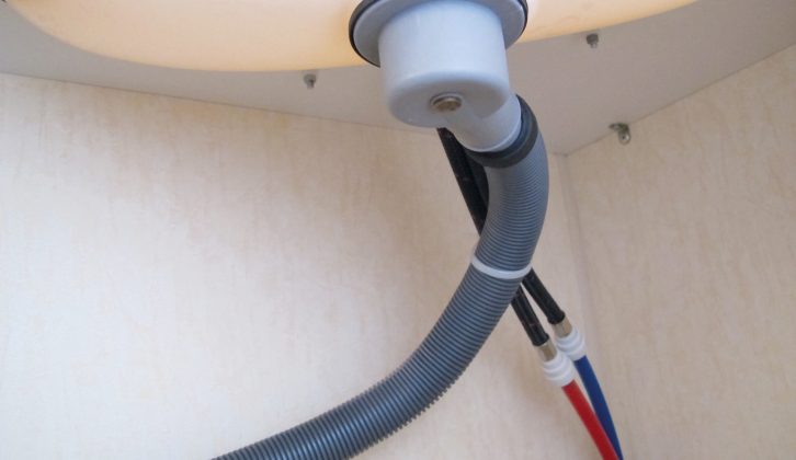 The waste pipe below this washbasin, fitted in an older Avondale caravan, is wisely installed with a marked downward slope