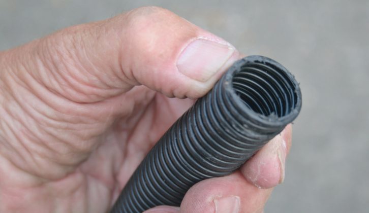 Unfortunately, most caravan manufacturers fit this cheap waste pipe with ridges on the inside, which easily trap remnants of food
