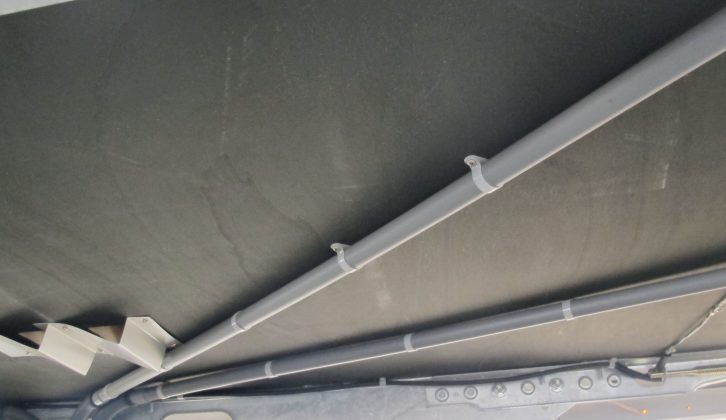 Beneath the floor of this 2014 Lunar, a rigid pipe efficiently takes water out the van – it’s a pity it lacks any slope on the run, though