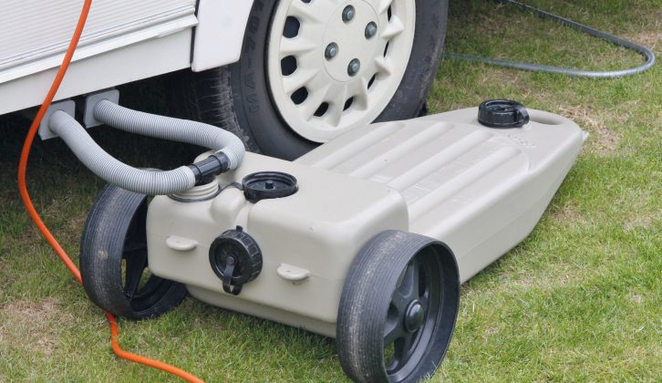 Here’s ‘good practice’ – the outlets are near the axle, while coupling hoses run downwards and discharge into the upper part of the container