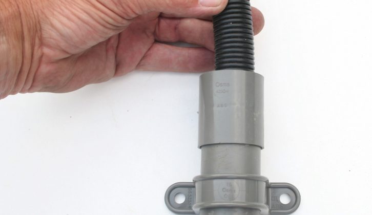 While it’s possible to fit larger outlets in some types of sink, it’s easier to cut the original hose and place it inside a vertical pipe