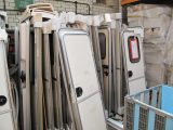 Magnum in Grimsby buys components direct from manufacturers and there are many new doors and other caravan spares in stock