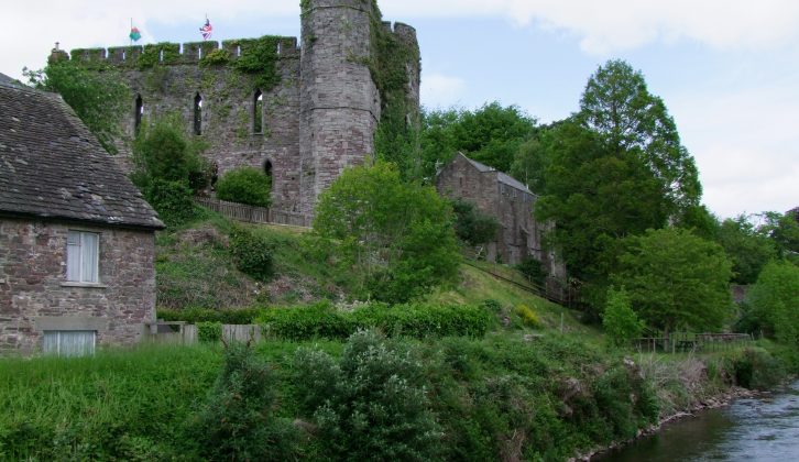 The atmospheric remains of Brecon Castle overlooking the River Honddu in Brecon town centre