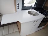 We like the three handy sockets and a worktop extension in the clean, bright kitchen of the Elegance 630 caravan
