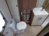 We love the rear washroom with chrome towel rail, vanity unit and separate shower cubicle in the Elegance 630 caravan