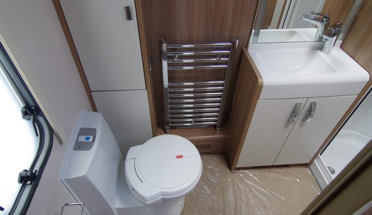 We love the rear washroom with chrome towel rail, vanity unit and separate shower cubicle in the Elegance 630 caravan