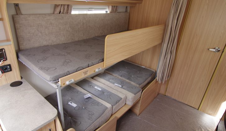 The side dinette turns into a single bed perfect for a child, and if you need to you can make up a bunk bed as well