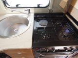 The Corona 564 has a big sink and a good cooker with three gas rings and an electric hotplate, plus a separate oven and grill