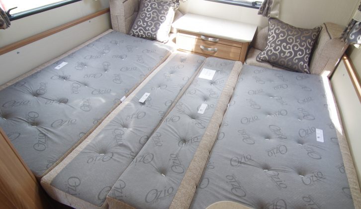 The rear lounge sofas make a king-sized bed, 1.85m  by 2.03m (6ft 1in by almost 6ft 8in) and there's a privacy blind