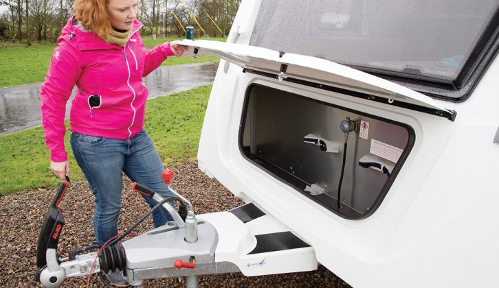 The front gas locker has plenty of room for two cylinders and kit, but the simple prop betrays the tourer’s budget roots