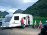 The Davies family, pictured at Glencoe with their Bailey Pageant Champagne, have been caravanning for nine years