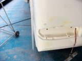 The cracked caravan bodywork is repaired by welding sections of ABS to the existing panel, and then smoothing it to ensure there are no tiny gaps through which moisture can get in
