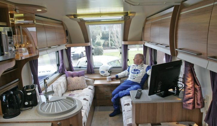 Reclining in luxury, Jonathan has a cuppa on site while he weighs up the competition