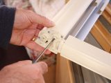 Ease the roller back into its housing and secure it by turning the slot anti-clockwise