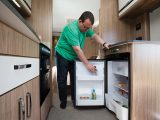 A 113-litre fridge-freezer is sited beneath the generous dresser