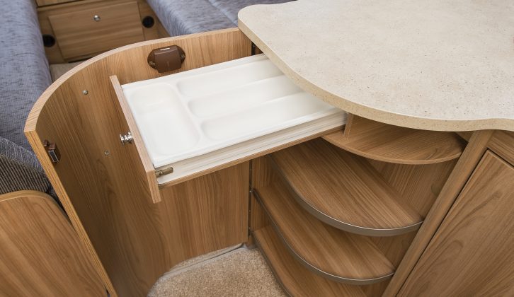A cutlery drawer is provided in the kitchen of this twin-axle Bailey caravan