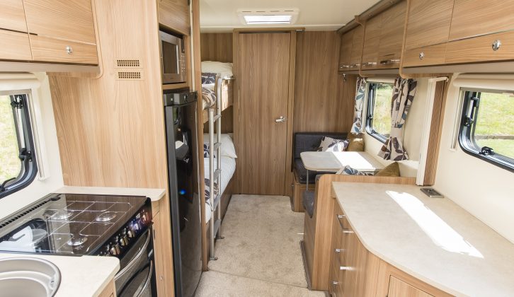 From the Palermo's front lounge you can look back to the kitchen with the fixed bunks and side dinette beyond