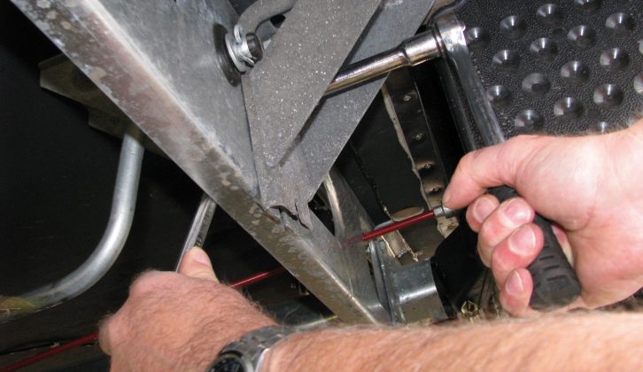 Tighten the nuts/bolts ensuring that there are no wires or obstructions in the way