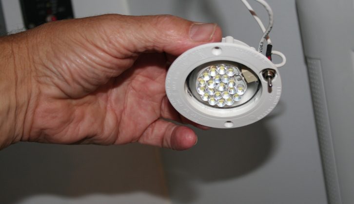This ceiling light with its own switch was removed from its mounting so the halogen bulb could be replaced with an LED unit