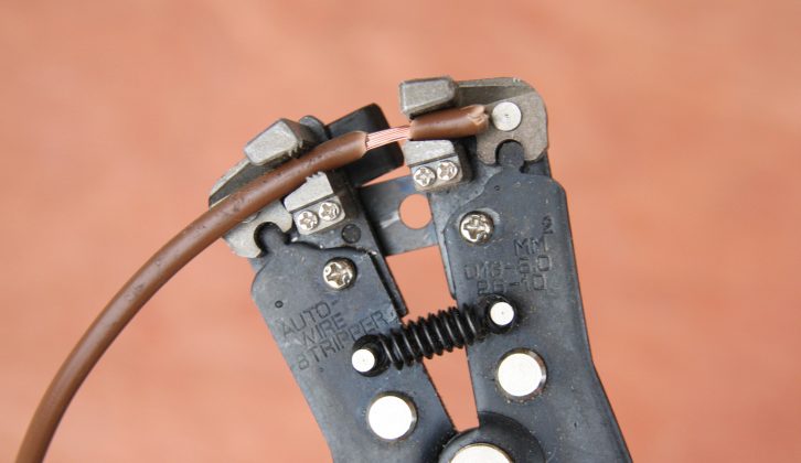 Removing the insulation sheath is easy if you use a purpose-made wire-stripper to avoid cutting through copper strands