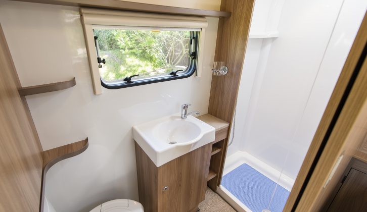 The full-width end washroom in the 2016 Brindisi benefits from a big shower with a bi-fold door
