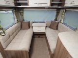 ￼The Venus 570/4's lounge has a single-pane front window and the sofas have sprung cushions with knee rolls