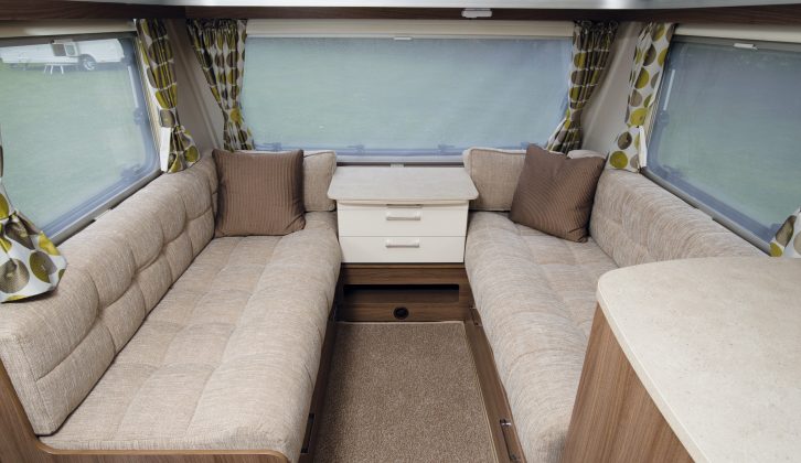 ￼The Venus 570/4's lounge has a single-pane front window and the sofas have sprung cushions with knee rolls