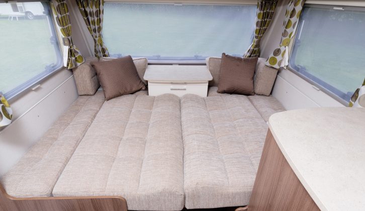 The made-up front double bed is larger than the sliding transverse island bed