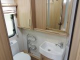 The washroom is well-equipped and spacious for a van this size