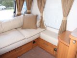 This 2009 Avondale had an L-shaped lounge, plain pale upholstery and contrasting curtains