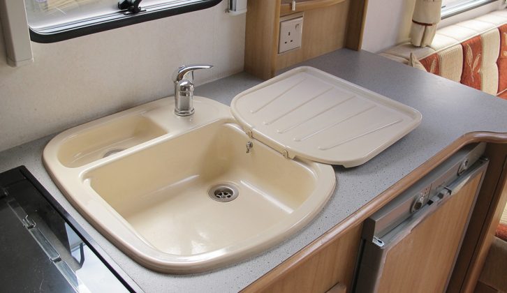 Twin-section plastic sinks with mixer taps (as in this 2005 Avondale Argente) took over from the enamel sinks of the 90s