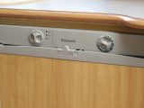 Early Electrolux fridge controls were confusing, but in this 2005 fridge one knob selects gas, 230V or 12V; the other sets the temperature
