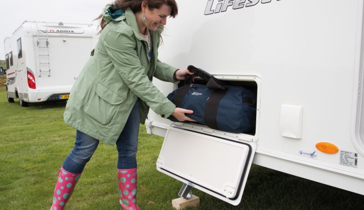 The nearside underseat storage space can be accessed from outside as well as from within