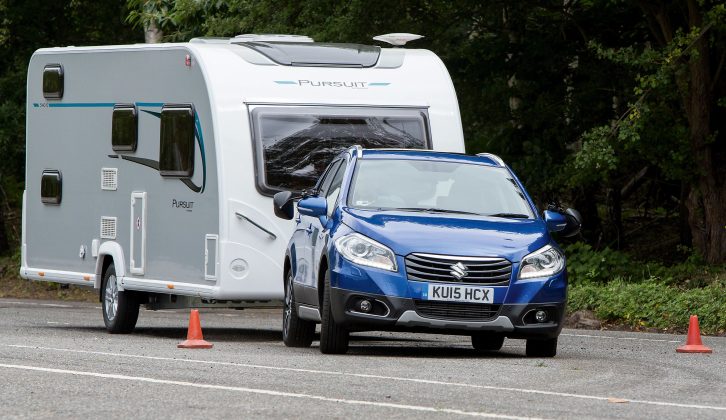 The SX4 was poised during its first runs through the slalom, but was pushed by the caravan when taking the route more quickly