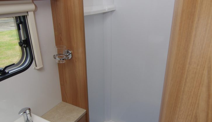 The separate shower is fully lined and has a roof vent