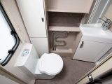 The bi-fold door in the end washroom allows plenty of leg room for the toilet