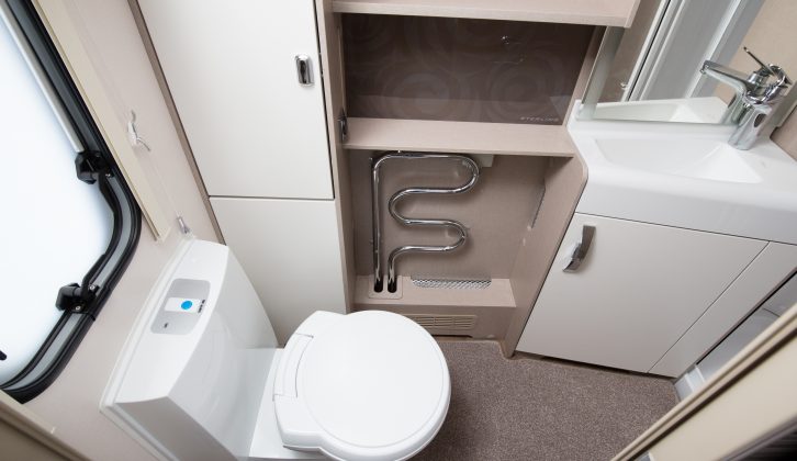 The bi-fold door in the end washroom allows plenty of leg room for the toilet
