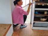Sharon paints the caravan's interior, using oil-based paints on the woodwork