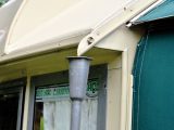 Quaint funnels catch rainwater from the caravan roof and channel it down the drain