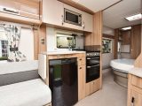 The offside kitchen in the 580 is compact, but has all the essentials, although worktop space is in short supply