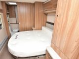 The island bed in the 580 retracts and has a Duvalay mattress