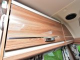 The overhead lockers in the lounge offer a decent amount of storage space and have positive-catch handles