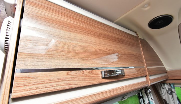 The overhead lockers in the lounge offer a decent amount of storage space and have positive-catch handles
