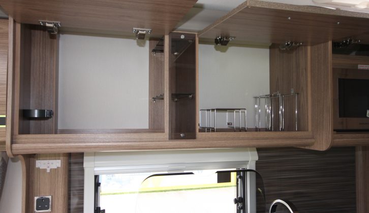 Overhead are a crockery cupboard and a cocktail cabinet, plus you can just see the microwave