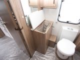 We rather like the linen basket found in the 2016 Coachman Laser 650's central bathroom