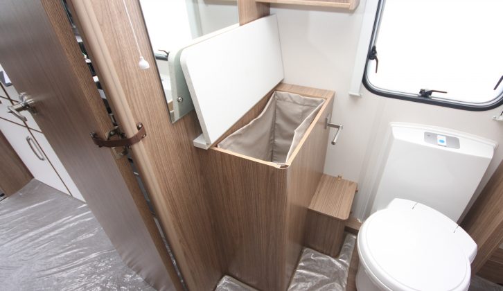 We rather like the linen basket found in the 2016 Coachman Laser 650's central bathroom