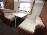 Four can sit in the dinette area, which also converts into a 1.80m x 1.00m bed