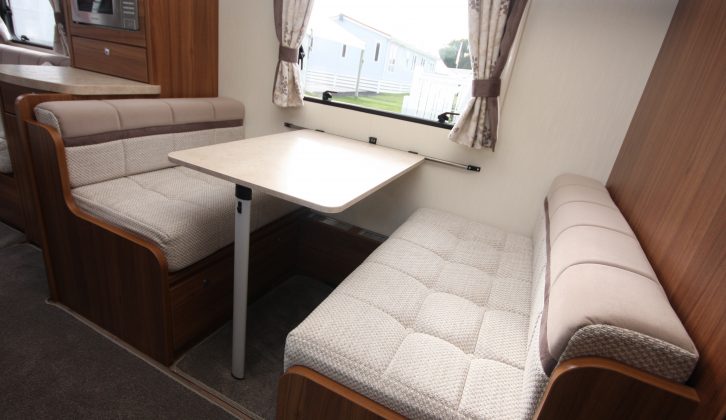 Four can sit in the dinette area, which also converts into a 1.80m x 1.00m bed