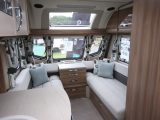 Colourful scatter cushions help brighten the front lounge in the 2016 Swift Challenger 590