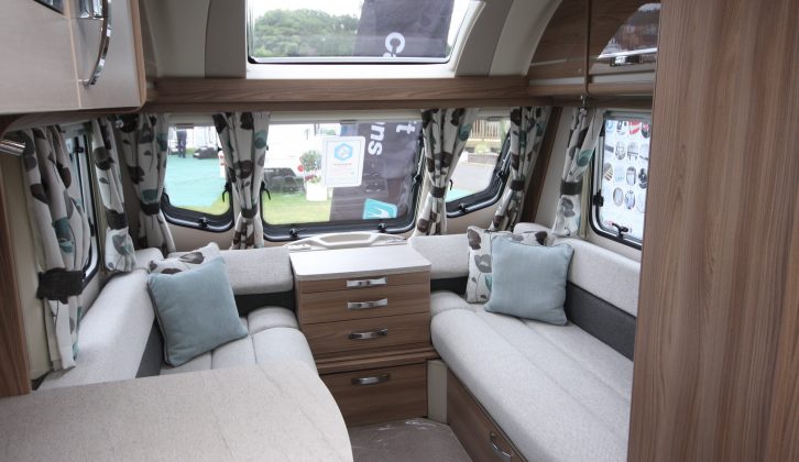 Colourful scatter cushions help brighten the front lounge in the 2016 Swift Challenger 590
